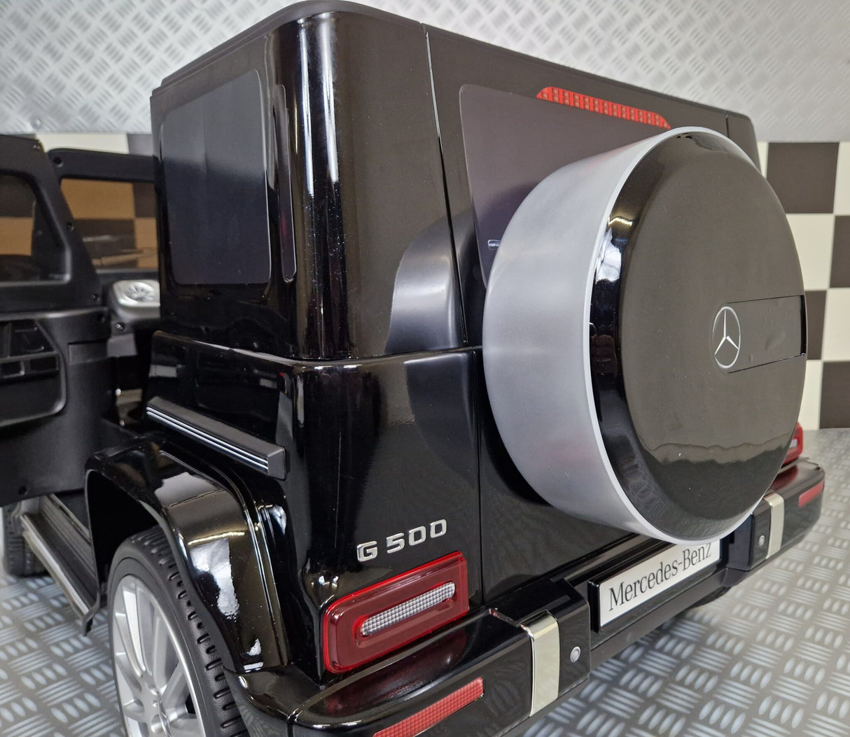 Electric children's car Mercedes G500 metallic black