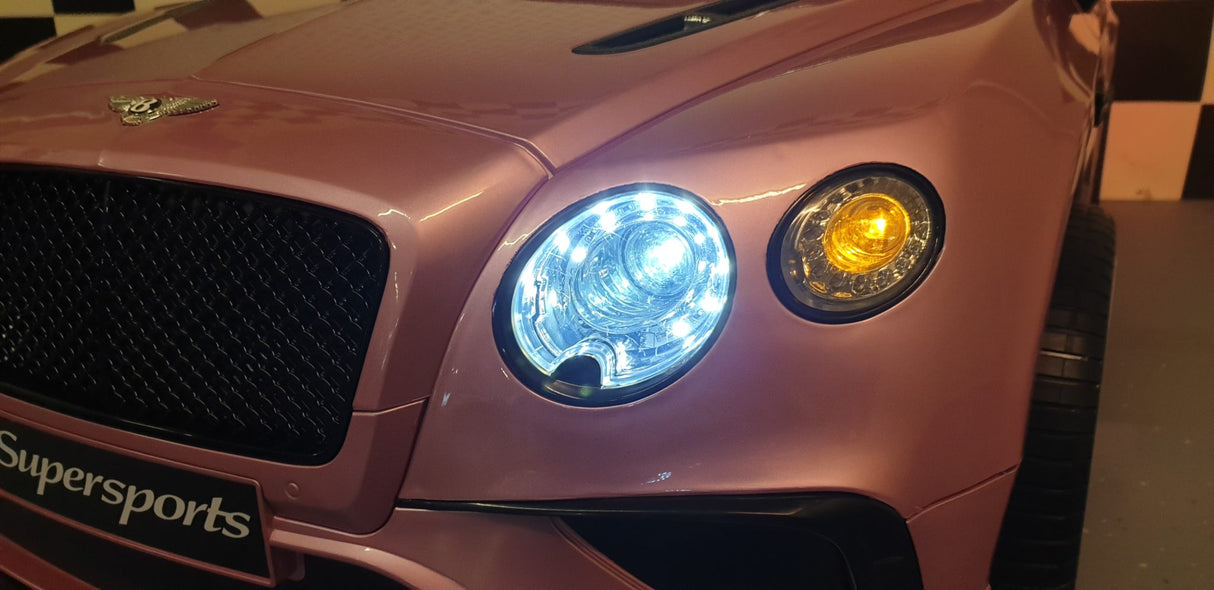 Children's battery toy car Bentley Continental metallic pink