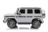 Battery children's car Mercedes G500 white 12 volts