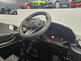 Electric children's car BMW M4 12 volt metallic black