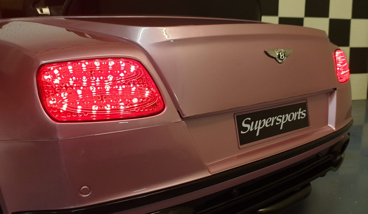 Children's battery toy car Bentley Continental metallic pink