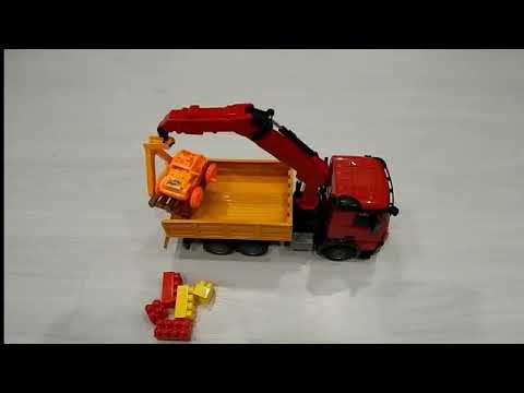 Fjernstyret Mercedes-Benz Arocs kranbil med styrbar kran