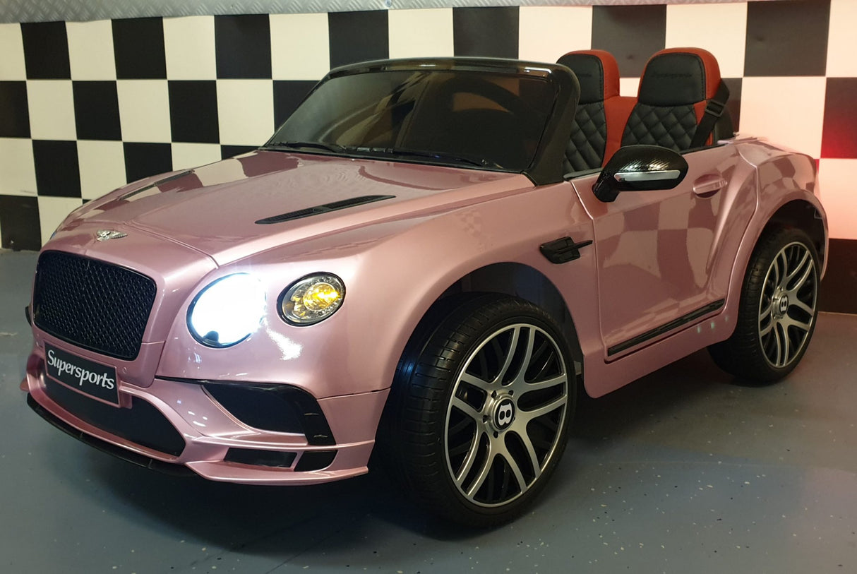 Children's battery toy car Bentley Continental metallic pink