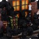 The Witches Litter Display of 36 Black Cat Familiars with a Decorated Stand